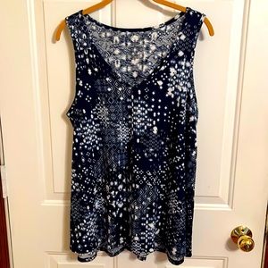 Women’s swing top, V Neck Navy Blue & White.  Bottom width is 30” across. Large